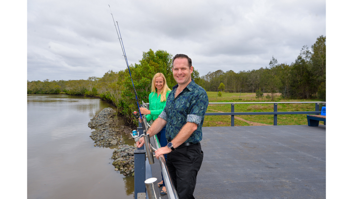 Environment Chair Councillor Jon Raven and Division 10 Councillor Miriam Stemp on the new micromesh fishing platform at Riedel Park in Carbrook.