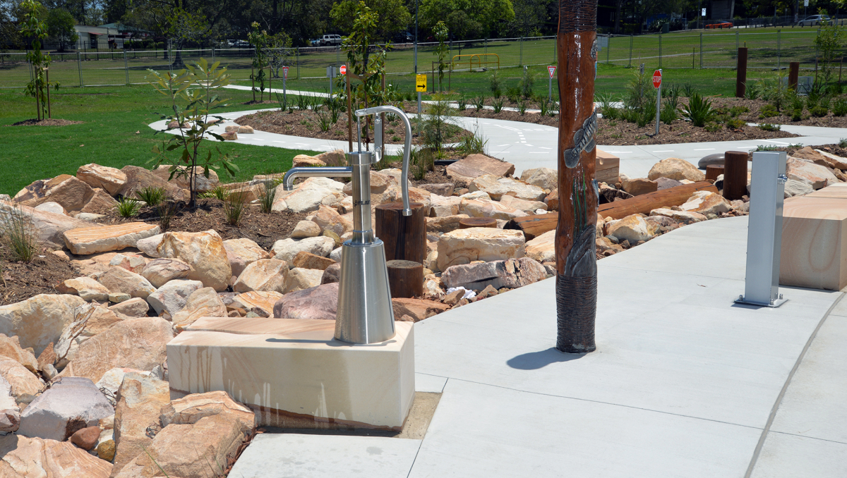 An image of totems with misters and water pumps are part of the nature play area in the upgraded Mabel Park in Slacks Creek.
