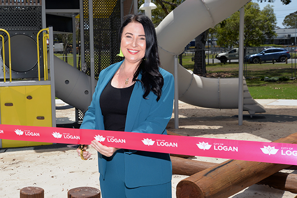 An image of Councillor Mindy Russell cutting a ribbon to open the upgraded Mabel Park in Slacks Creek.