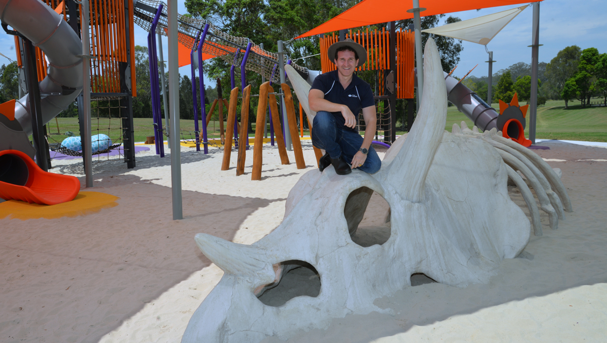 An image of Lifestyle Chair and Division 6 Councillor Tony Hall at the dinosaur-inspired Riverdale Park at Meadowbrook.