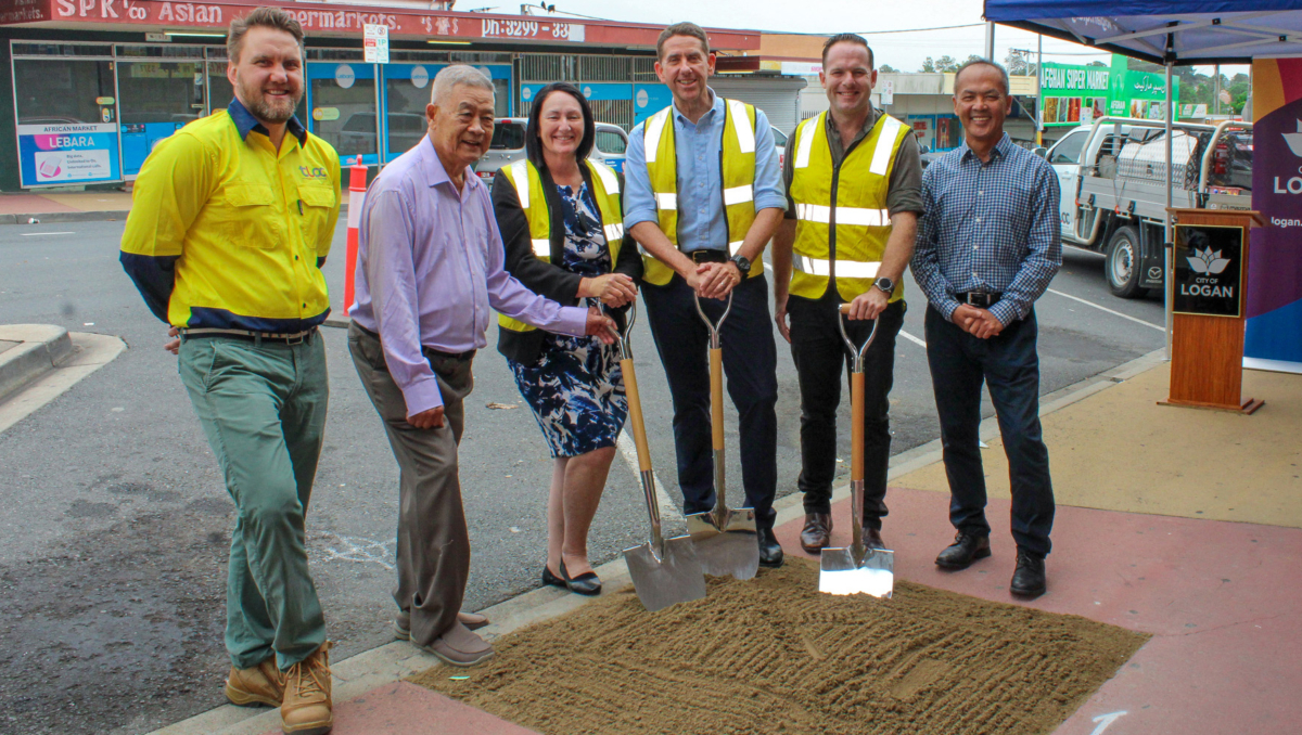 Division 2 Cr Teresa Lane, Woodridge MP Cameron Dick and Economic Development Chair Cr Jon Raven (centre) with TLCC Project Manager Sam Lock (left), Global Food Markets founder Paul Khieu and local business owner Victor Lee (right).