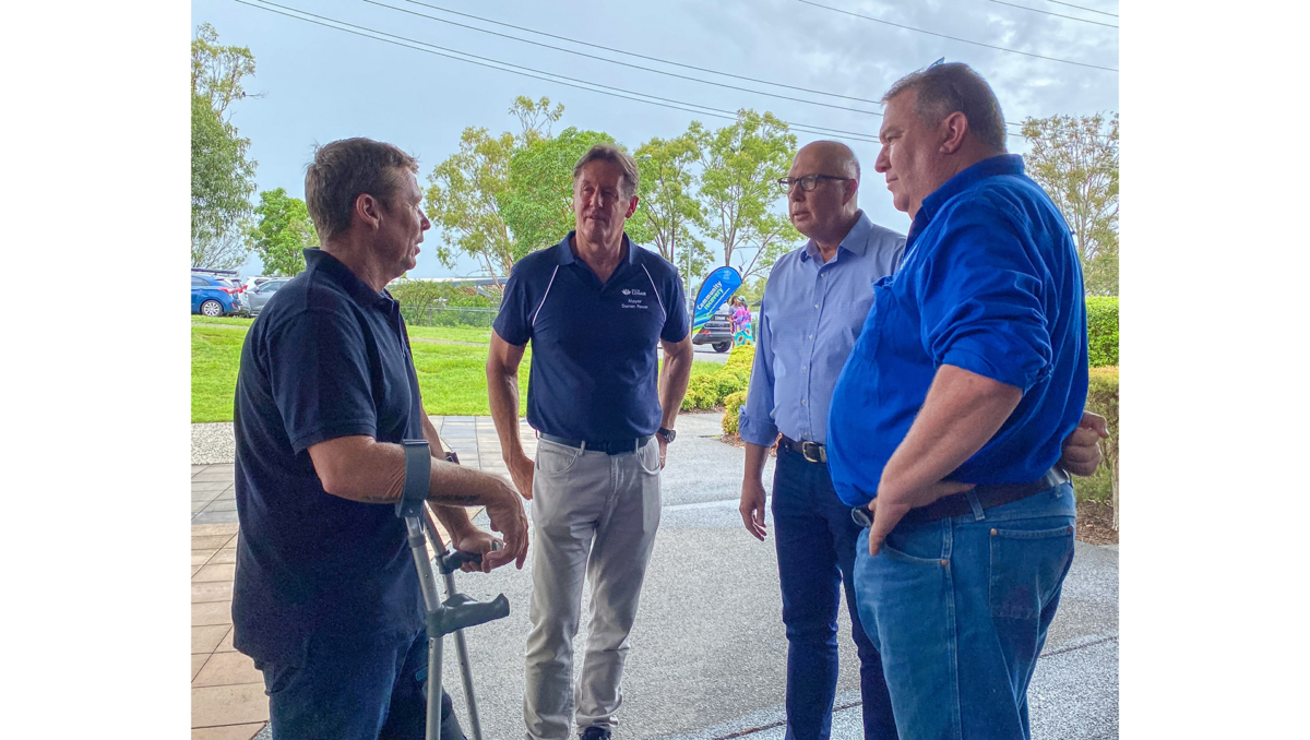 Mayor Darren Power (centre) and Division 9 Councillor Scott Bannan (left) speak with Federal Opposition Leader Peter Dutton and Wright MP Scott Buchholz, who visited the Jimboomba Recovery Hub on Monday, January 8.