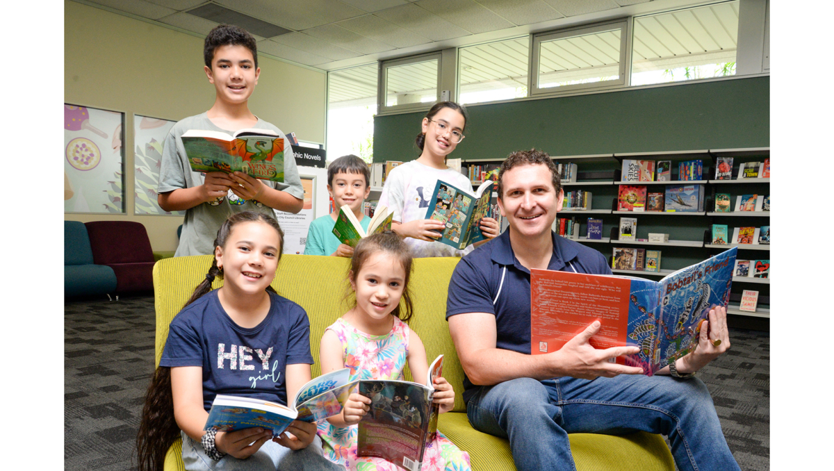 Lifestyle Chair Councillor Tony Hall (far right) and Cassella family members (back row from left), Giovanni, Luciano and Malina and (front left) Rosalena and Selena promote Logan Libraries.