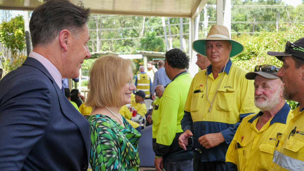 Her Excellency, the Honourable Doctor Jeannette Young AC PSM, Governor of Queensland, and Mayor Darren Power speak with Council team members Lance Blake, Rick Baker and Jason Farmer.