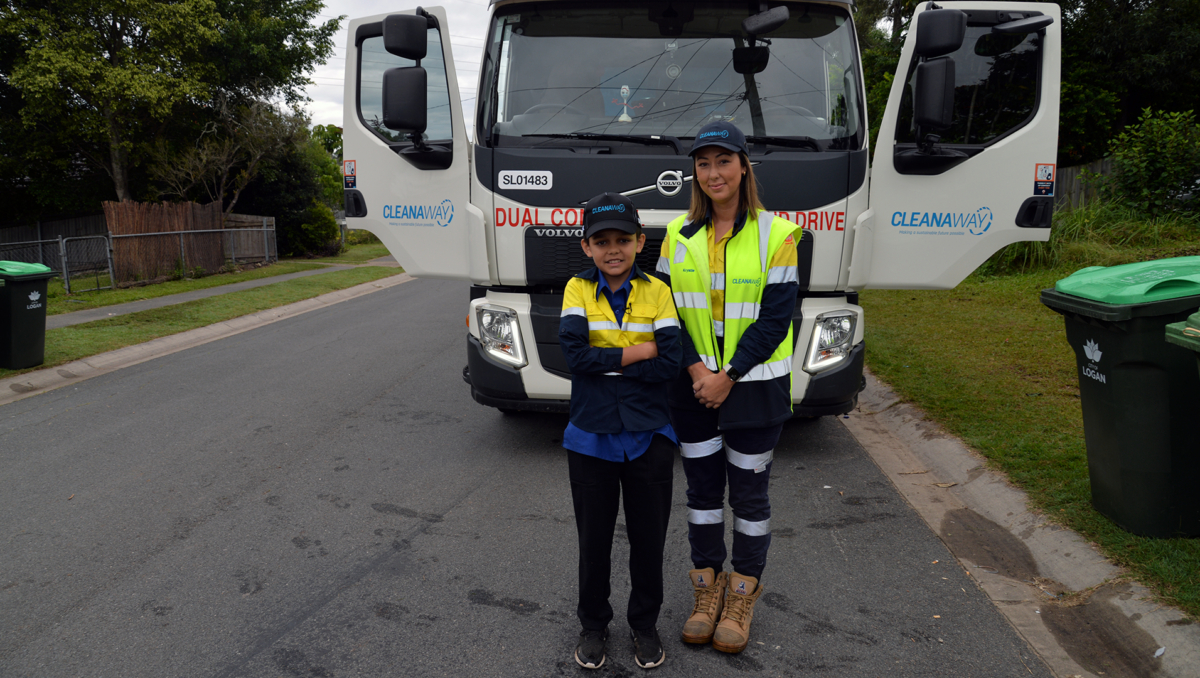 An image of Ethan Nilsen, 11 of Daisy Hill with Cleanaway garbage truck driver Krystle Tilley.