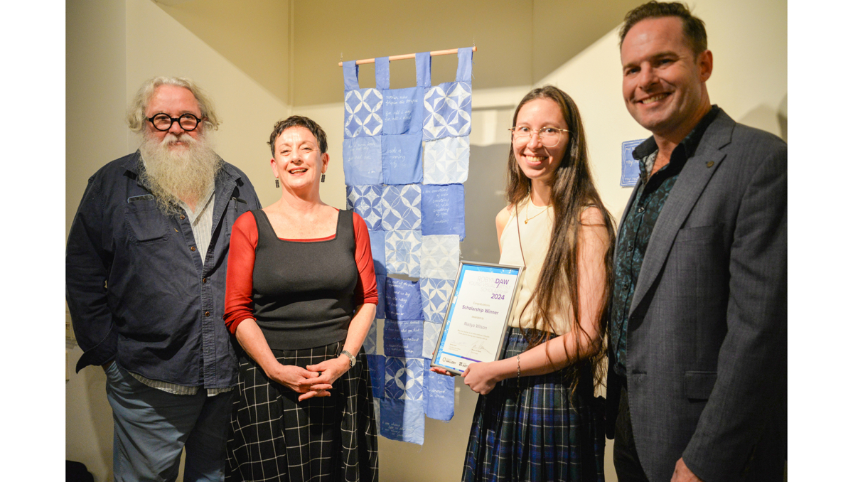 Robyn Daw's partner Ian Friend (left), close friend Debbie Abraham and City of Logan Mayor Jon Raven (far right) congratulate Robyn Daw Young Visual Artist Scholarship recipient for 2024 Nadya Wilson (second from right).