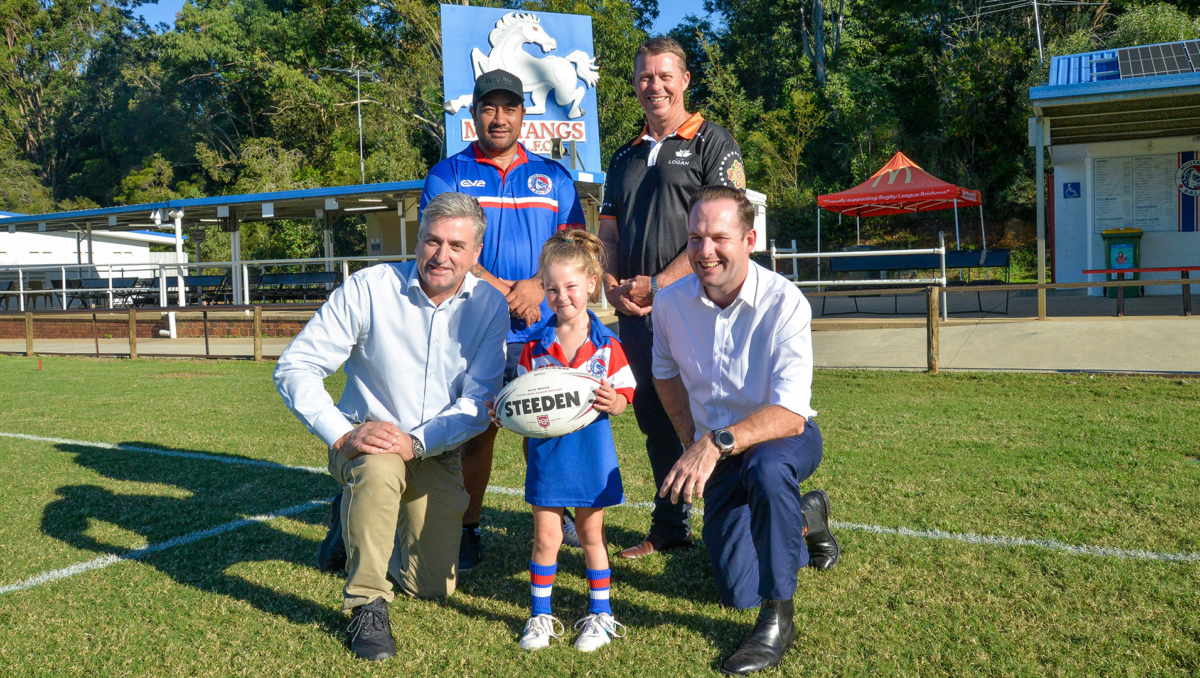 City of Logan Mayor Jon Raven (bottom right) with Deputy Mayor and Division 9 Councillor Scott Bannan (top right), Logan MP Linus Power (bottom left), Mustangs president Johnny Peseta and future Mustang Patience Roil, 5, of Logan Reserve.