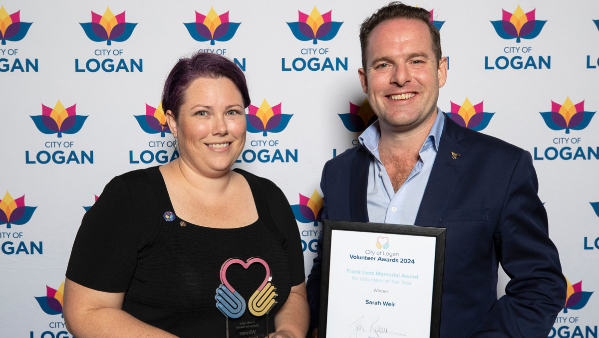 Volunteer of the Year Frank Lenz Memorial Award winner Sarah Weir with Mayor Jon Raven.