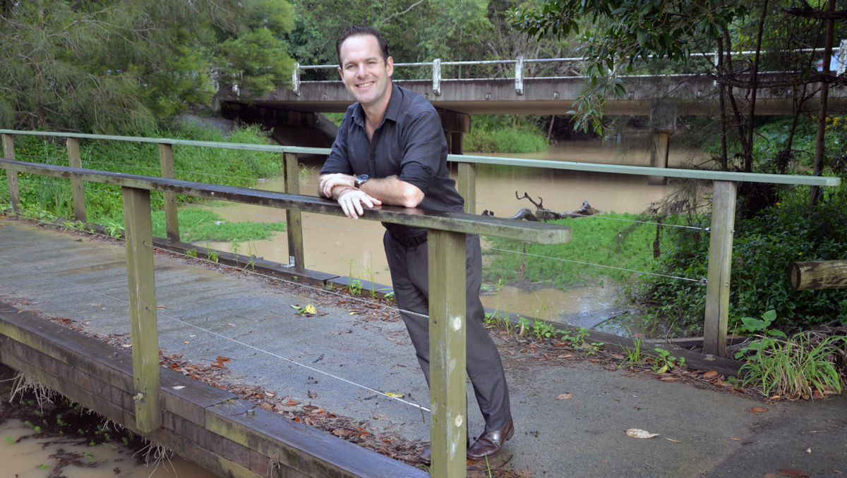 An image of Mayor Jon Raven at Windaroo Creek in Noyer Park at Bahrs Scrub.