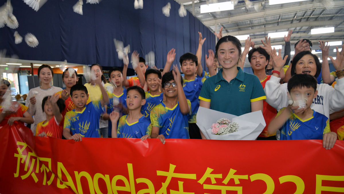 Shuttlecocks fly at a Paris Olympics send-off for badminton star Angela Yu.