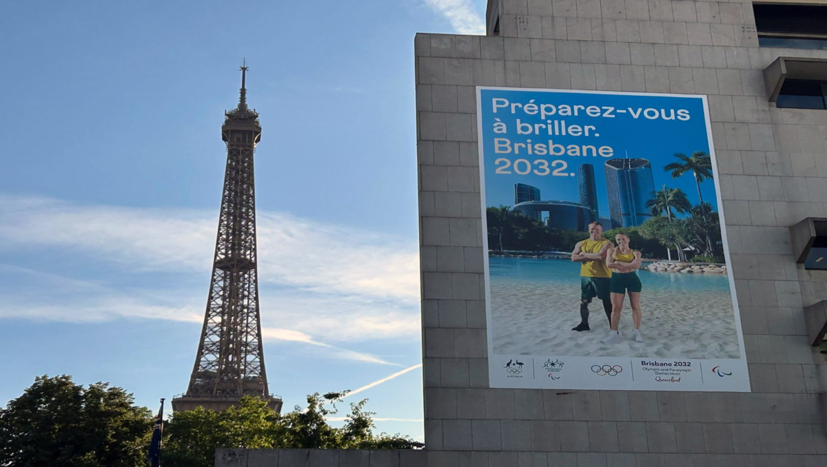 And image of the Brisbane 2032 billboard in Paris featuring Logan athlete Genevieve Gregson.