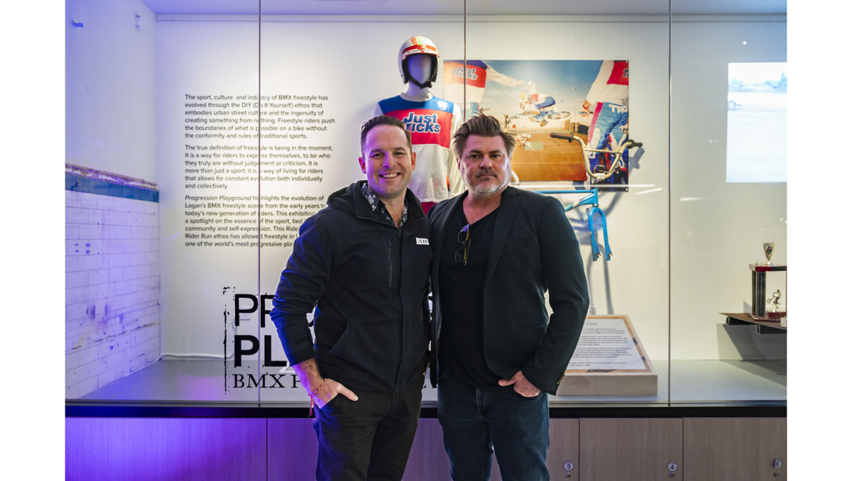 City of Logan Mayor Jon Raven (left) with Progression Playground curator BMX freestyle historian and professional rider Ross D Lavender at the recent exhibition opening at the Living Museum of Logan.