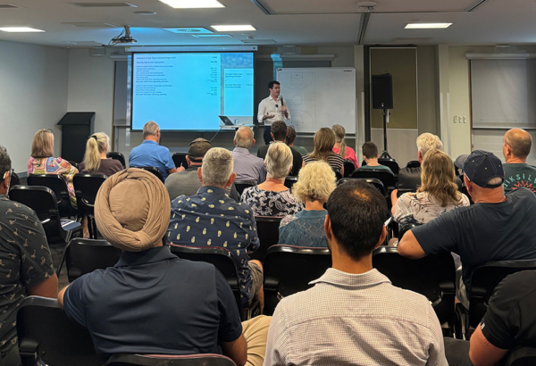 An image of Cr Jacob Heremaia discussing local projects at a recent Division 8 community meeting.