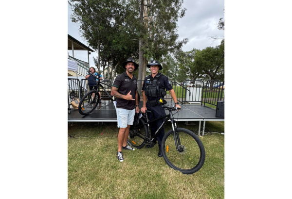 An image of Cr Nathan St Ledger (left) delivering new mountain bikes to Acting Senior Sergeant Scott Behnke for use in local off-road patrols.