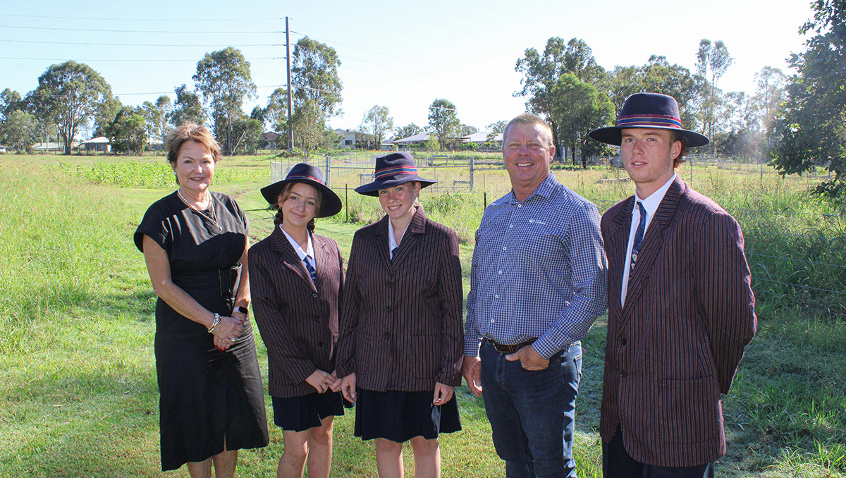 An image of Cr Scott Bannan with Emmaus College Principal Jane Egan and school Cattle Show Team members (from left) Claire Rasmussen (Year 10), Alicia Dyke (Year 11) and Taj Croker (Year 12).