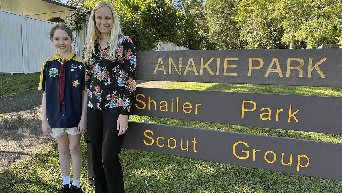 An image of Cr Miriam Stemp and Cub Scout Matilda in Anakie Park at Cornubia.