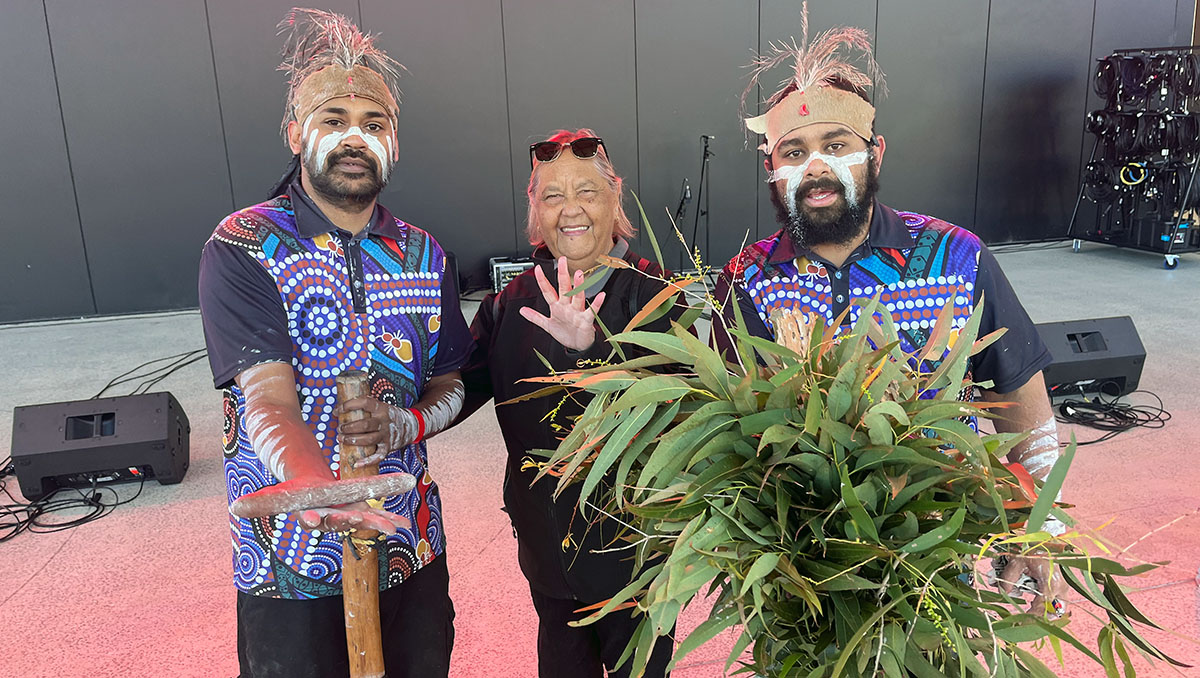 An image of Aunty Robyn Williams, with members of the Brisbane-based Tribal Experience, gave the Welcome to Country at the NAIDOC Family Fun Day.