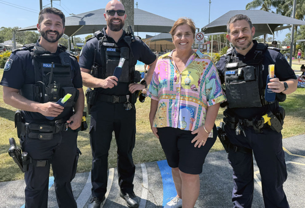 Cr Karen Murphy treats officers from Eagleby Neighbourhood Police Beat with refreshing ice blocks at the recent Eagleby pool party. An image of Cr Karen Murphy treating officers from Eagleby Neighbourhood Police Beat with refreshing ice blocks at the recent Eagleby pool party.
