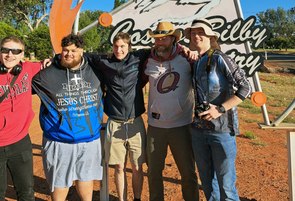 Chappy Nick Carroll (in cowboy hat) with The Great Outback Road Trip participants (from left) Caleb Mills, Mac McPhilbin, Eli Appleby and Ethan Hocking. An image of Chappy Nick Carroll (in cowboy hat) with The Great Outback Road Trip participants (from left) Caleb Mills, Mac McPhilbin, Eli Appleby and Ethan Hocking.
