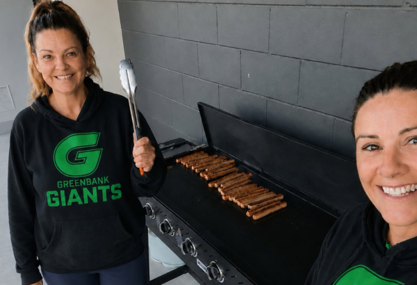 Greenbank Giants AFL volunteers Brooke Hambleton (left) and Leanne Wolfe